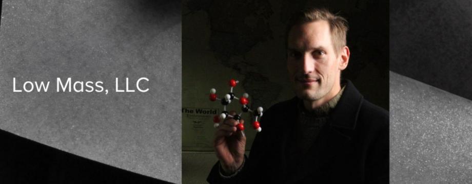 Jason with a model of a cellulose molecule, the most abundant organic compound on Earth, and one of the materials his company utilizes to deliver carbon-conscious alternatives to traditional design and structures. 